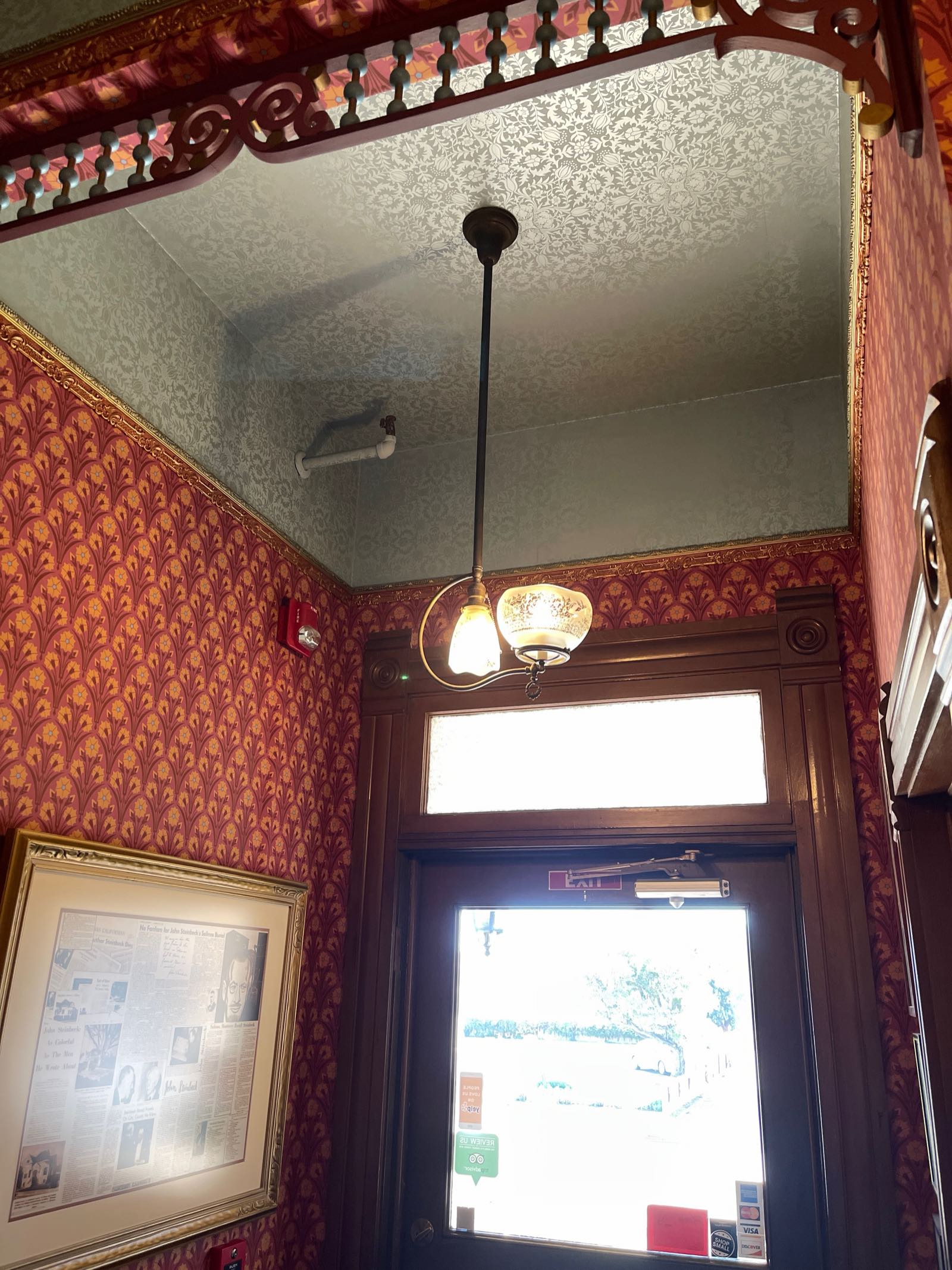 Wood-paneled entryway and staircase inside the John Steinbeck House in Salinas.